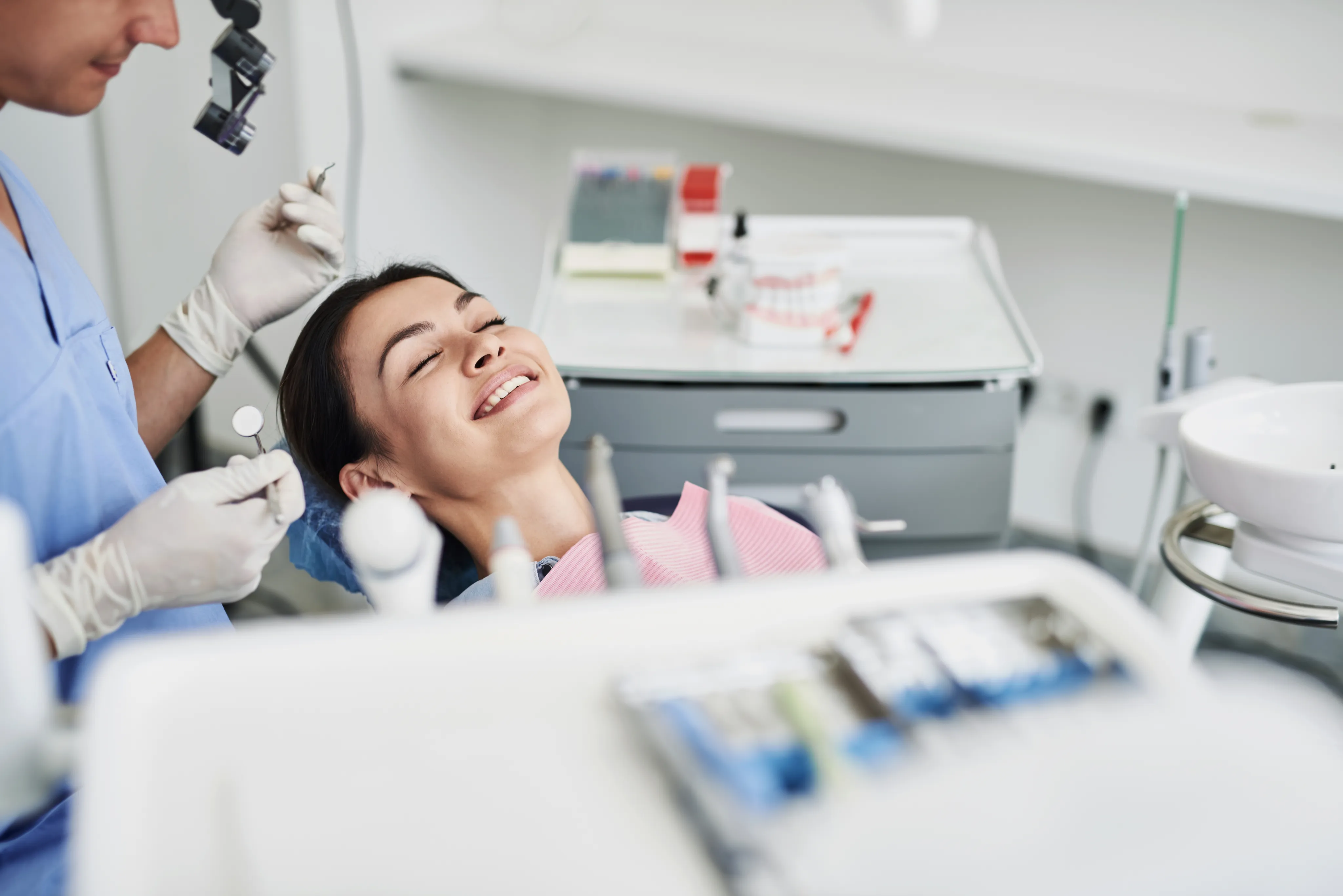 Relaxed patient smiling during a dental visit