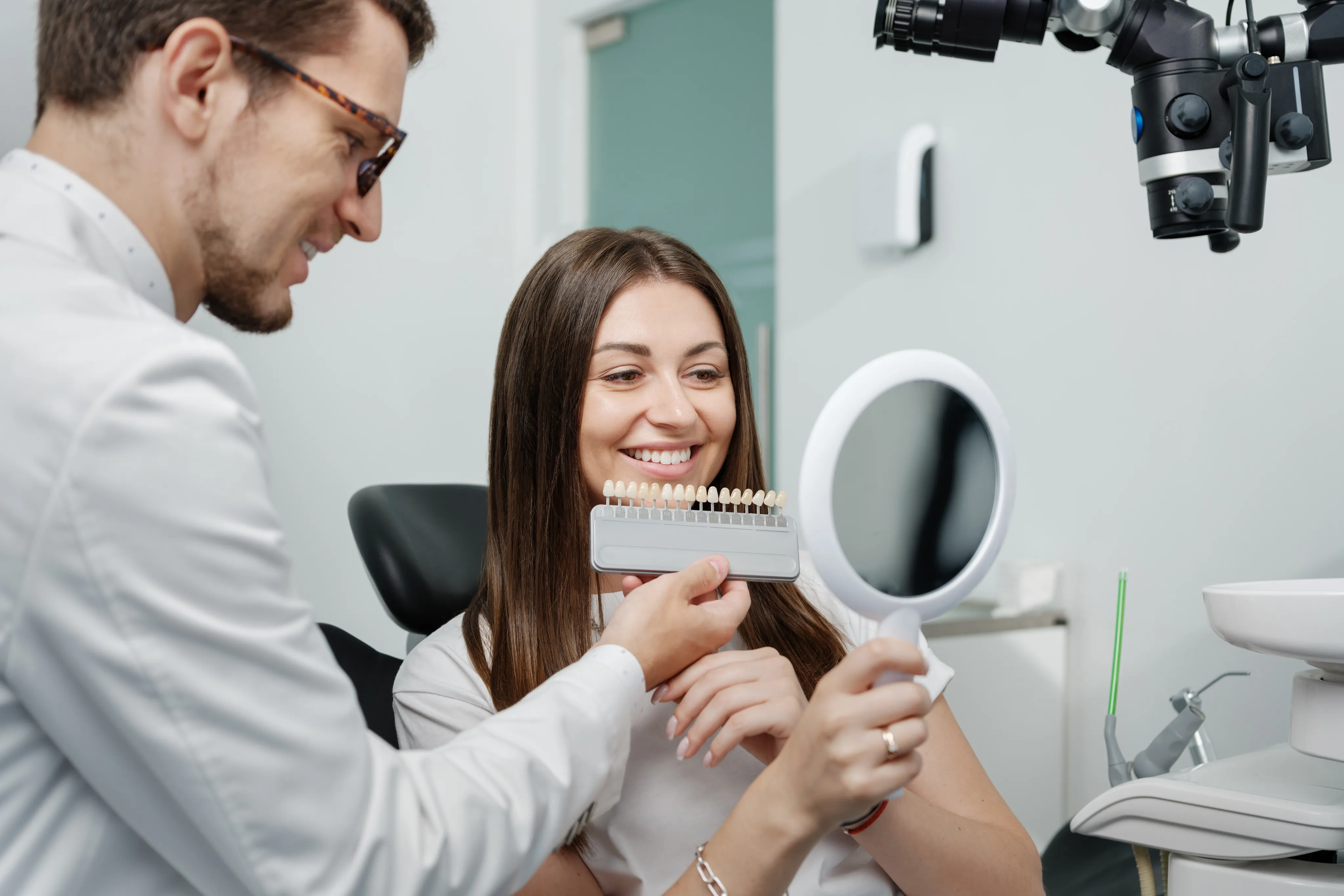 Patient choosing the perfect shade for their new smile